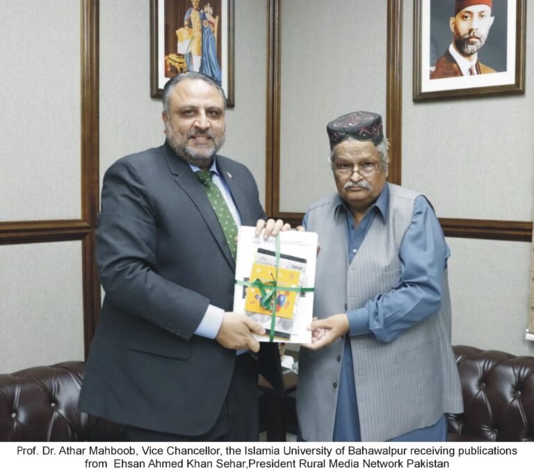 Ehsan Ahmed Sehar presents UNESCO, RSF and RMNP publications to Vice Chancellor Islamia University